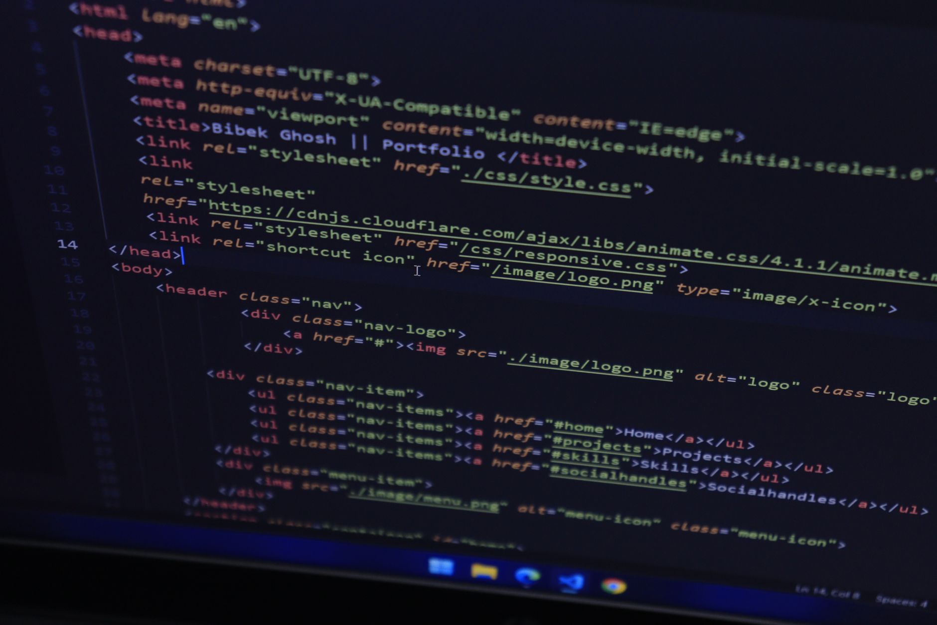 Lines of website code displayed on a monitor