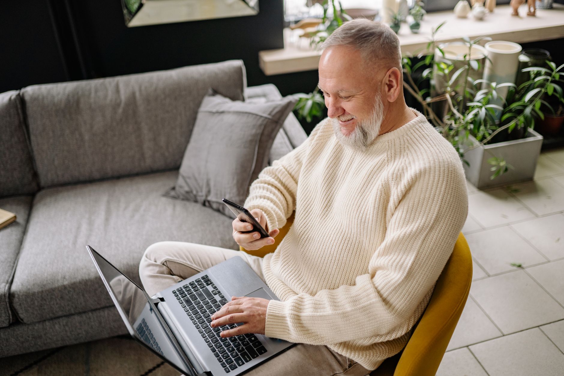 AI search results for a Bakersfield business on a laptop and phone