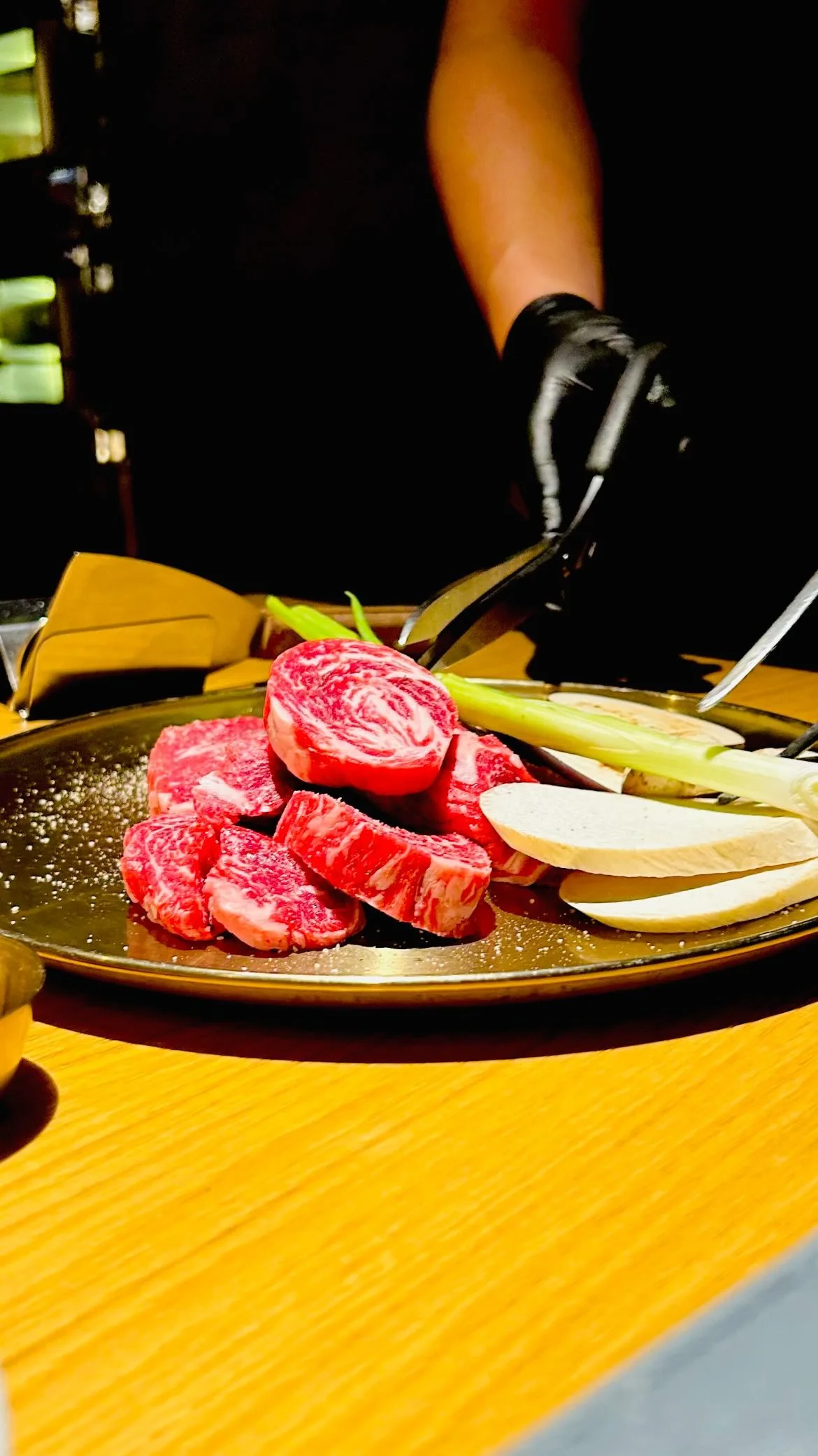 The plated Daedo ribeye, marbled and ready for the tableside grill
